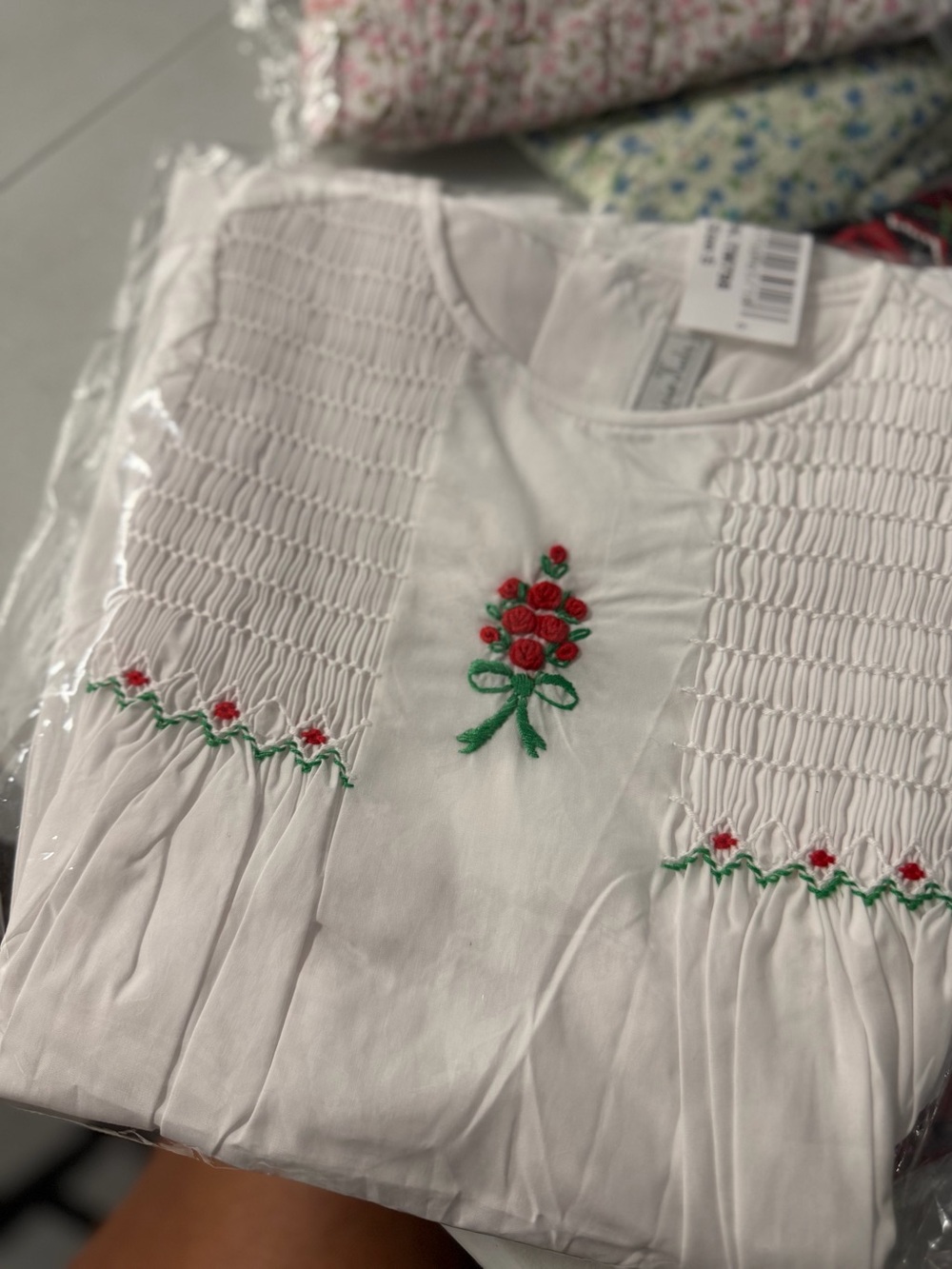 Smocked white size 5  dress with floral center new with tag